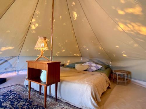 Postel nebo postele na pokoji v ubytování Glamping Spot - La Flotte en Ré