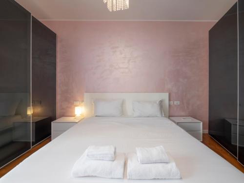 Katil atau katil-katil dalam bilik di I-Host Apartment - Certosa 92