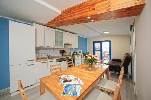 Kuchyň nebo kuchyňský kout v ubytování Appartements Marina Niderviller