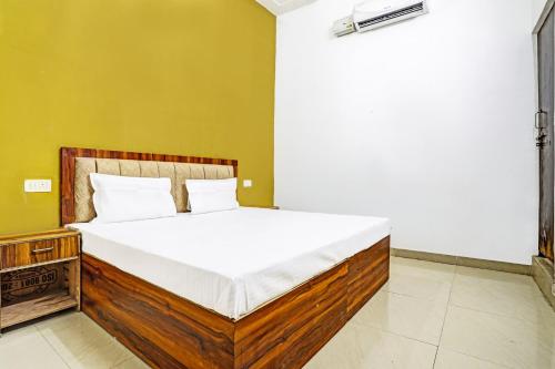 Ένα ή περισσότερα κρεβάτια σε δωμάτιο στο Hotel O PARK'S HOTEL