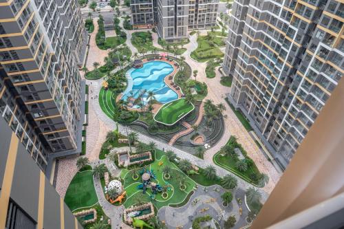 an aerial view of a park in a city with tall buildings at Studio-GH5 - Vinhomes Grand Park - Thu Duc City in Long Bình