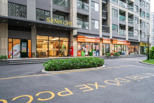 an empty parking lot in front of a building at Studio-GH5 - Vinhomes Grand Park - Thu Duc City in Long Bình