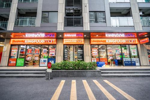 a store front of a building with signs on it at Studio-GH5 - Vinhomes Grand Park - Thu Duc City in Long Bình