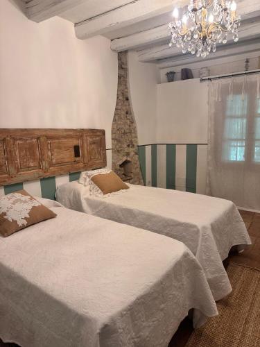 Una cama o camas en una habitación de BednBarchessa