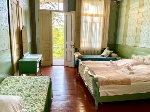 Postel nebo postele na pokoji v ubytování Martv'Elle Boutique Guesthouse
