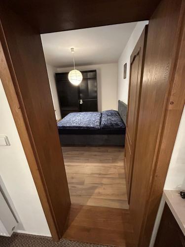 Ένα ή περισσότερα κρεβάτια σε δωμάτιο στο Apartmán Štěpánkův Pivovar