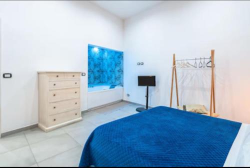 Giường trong phòng chung tại La Casa Di Eva In Via Nizza