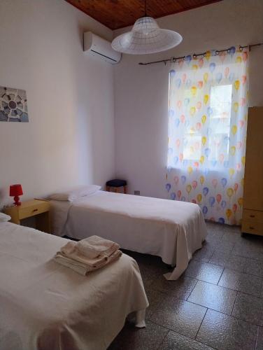 Postel nebo postele na pokoji v ubytování Dal Professore