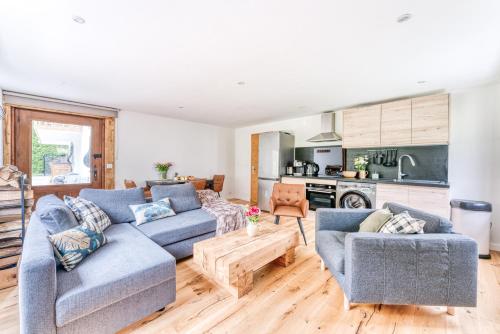 Η κουζίνα ή μικρή κουζίνα στο Appartement de Luxe avec Jacuzzi, Vue Montagne et Jardin