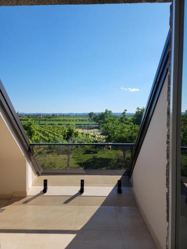 a view from the balcony of a building at Lahuta e Vjeter Agroturizem in Laç
