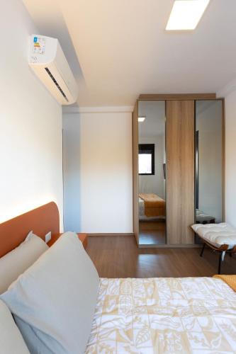 Katil atau katil-katil dalam bilik di Le Chalet - Luxury Apartment com 2 ar condicionado