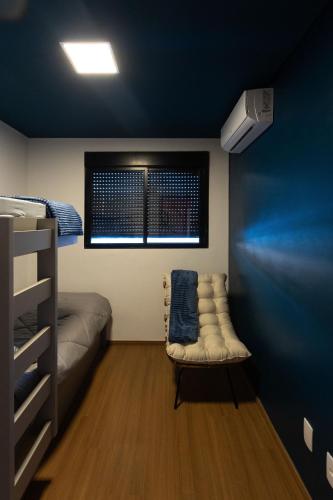 Katil atau katil-katil dalam bilik di Le Chalet - Luxury Apartment com 2 ar condicionado