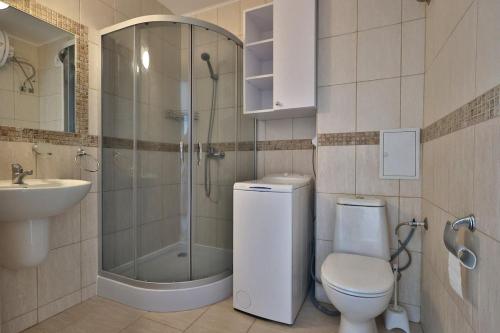 Ένα μπάνιο στο Apartament Casa del Sol no 115