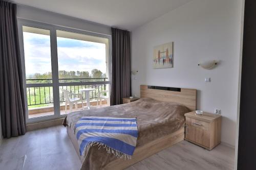 Ένα ή περισσότερα κρεβάτια σε δωμάτιο στο Apartament Casa del Sol no 115