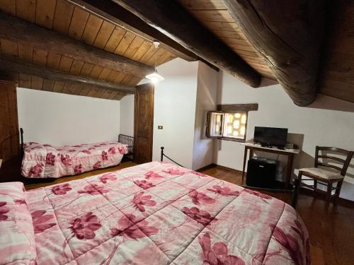 Katil atau katil-katil dalam bilik di Locanda di Federico