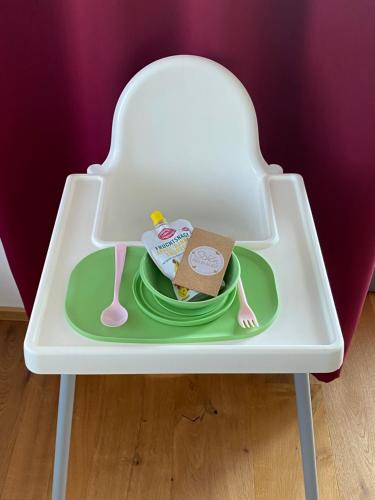 a toy table with a plate of food on it at CityLake G23 Apartments mit kostenloser Parkmöglichkeit !! in Gmunden