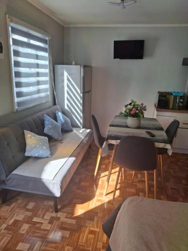 TV a/nebo společenská místnost v ubytování Habitaciones Barrancas