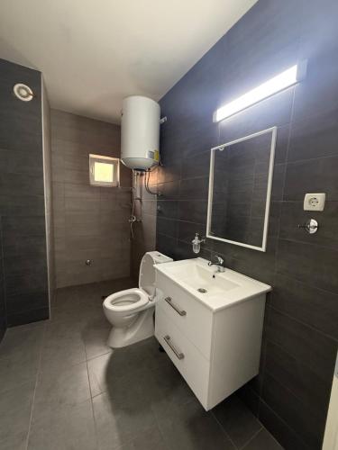 Ένα μπάνιο στο Restaurant & Apartments Lipa