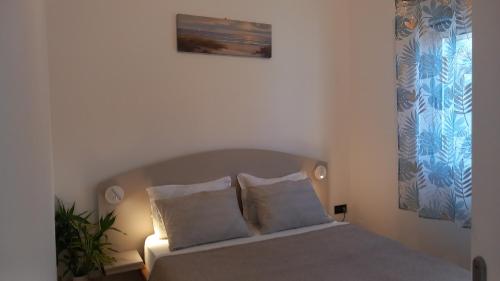 Ένα ή περισσότερα κρεβάτια σε δωμάτιο στο Le coco mango