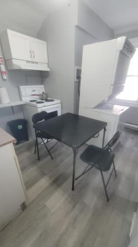 Η κουζίνα ή μικρή κουζίνα στο Upper Floor 2 bedroom Unit