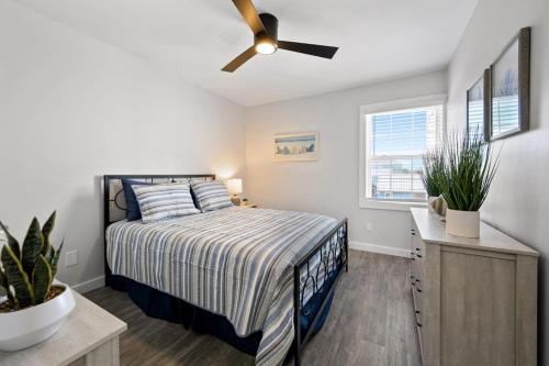 En eller flere senge i et værelse på Carolinas Ocean Playground