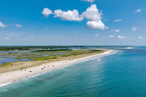 an aerial view of a beach in the ocean at Paws. . . and RELAX. A PF getaway in the clouds in Carolina Beach