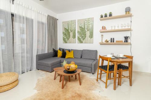 Χώρος καθιστικού στο Modern 2BR Escape Near Bayahibe Beach and Pool