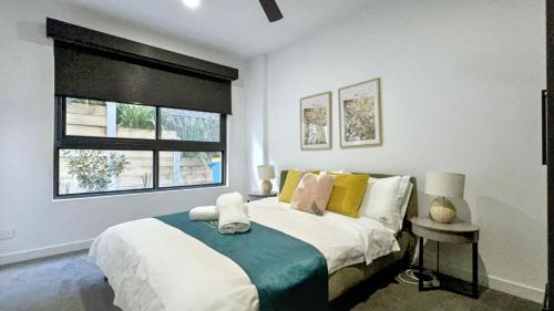 Ένα ή περισσότερα κρεβάτια σε δωμάτιο στο Beautiful property in Balwyn with great view