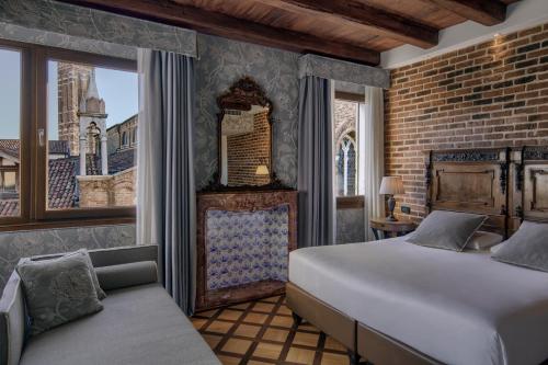 Postel nebo postele na pokoji v ubytování B&B Bloom Settimo Cielo