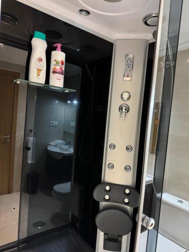 a small bathroom with a toilet and a sink at Apartamento Rammari Spa in San Miguel de Reinante