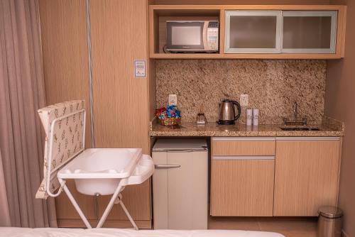 Dapur atau dapur kecil di Viageiro Casa Hotel