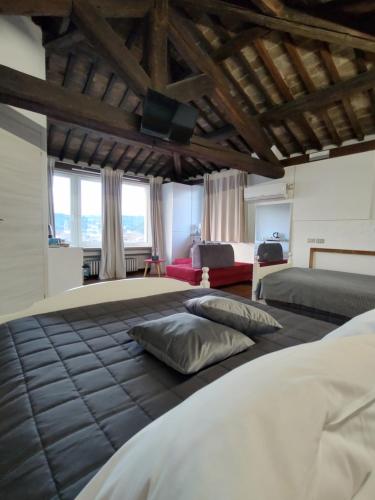 Postel nebo postele na pokoji v ubytování Verona Relax & Stay ROOMS
