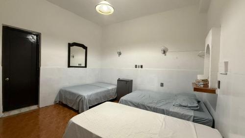 Postel nebo postele na pokoji v ubytování Hotel Climar