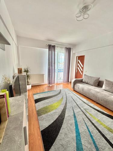 Ένα ή περισσότερα κρεβάτια σε δωμάτιο στο Apartament Central Satu Mare