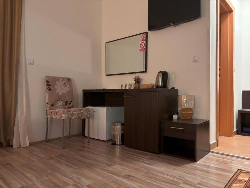 Μια τηλεόραση ή/και κέντρο ψυχαγωγίας στο Guest House Bunčić Rooms