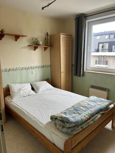 En eller flere senge i et værelse på Panorama Sud