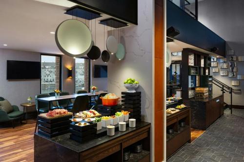 a buffet in a hotel room with food on a table at Boston Marriott Long Wharf in Boston