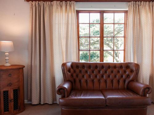 Χώρος καθιστικού στο Idube Guest House