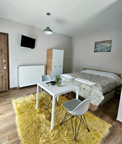 Postel nebo postele na pokoji v ubytování Studios Iris