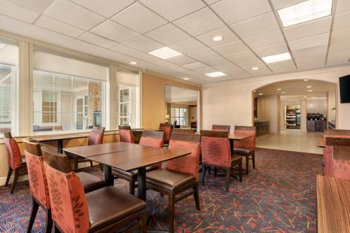a conference room with a table and chairs at Residence Inn Baltimore White Marsh in Baltimore