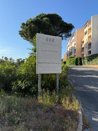 a sign on the side of a road at Duplex sur le Golfe de Saint Tropez - Panoramic View in Cogolin