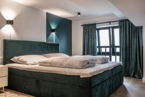 Ένα ή περισσότερα κρεβάτια σε δωμάτιο στο Oran Apartment 5