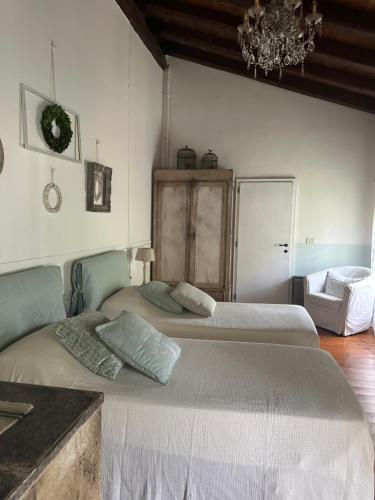 Una cama o camas en una habitación de BednBarchessa