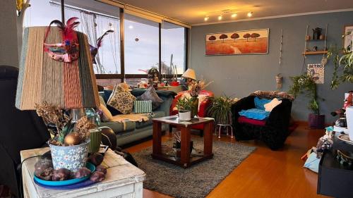 Posezení v ubytování MYSTIC LODGING Habitaciones privadas con baño