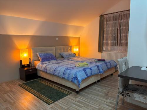 Ένα ή περισσότερα κρεβάτια σε δωμάτιο στο Guest House Bunčić Rooms & Apartments