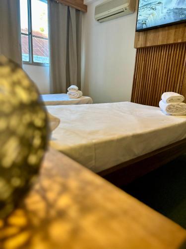 Postel nebo postele na pokoji v ubytování Del Galpón Hotel
