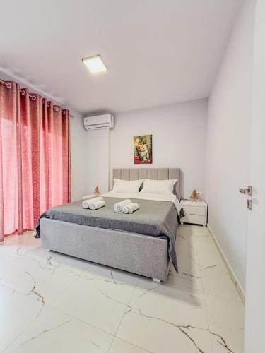 Postel nebo postele na pokoji v ubytování ODORE DI MARE APARTMENTs