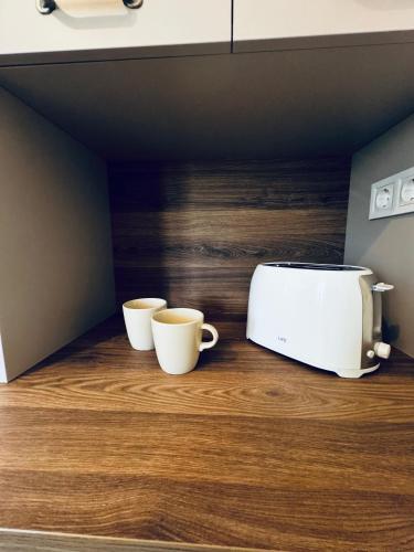 Olive and Stoneにあるコーヒーまたはお茶