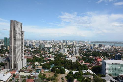 Nespecifikovaný výhled na destinaci Cebu City nebo výhled na město při pohledu z apartmánu
