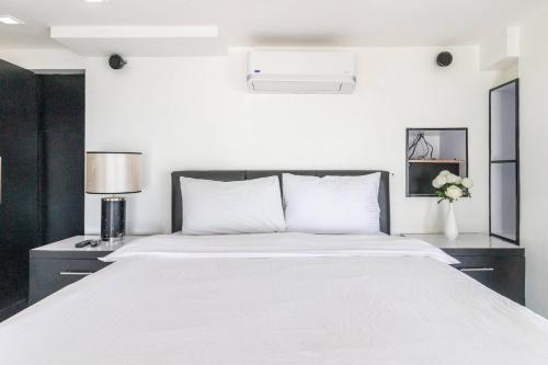 Postel nebo postele na pokoji v ubytování Elegance - Ultima Residences